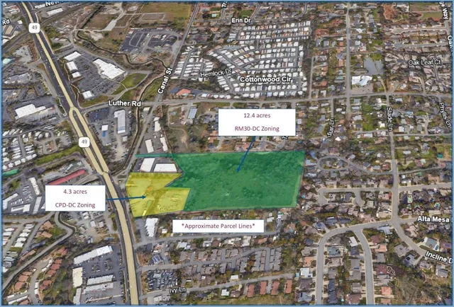 a view of a tree in front of a building