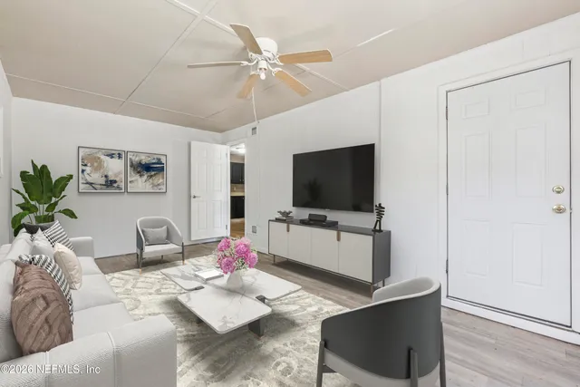 a view of an empty room with a window