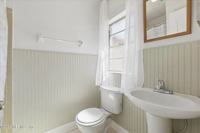 a kitchen with a sink and a stove