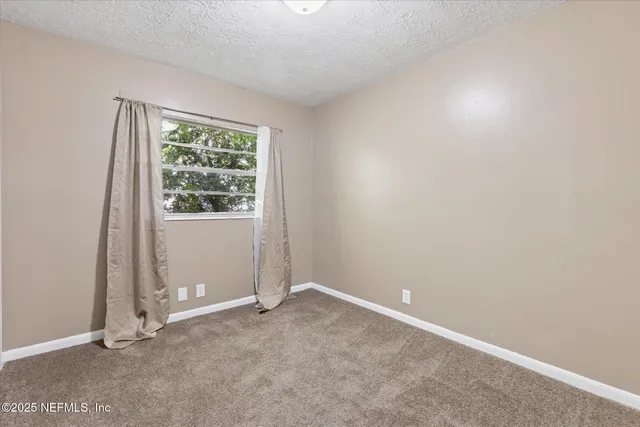 a view of kitchen with wooden floor