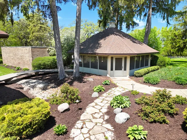 a kitchen with granite countertop a sink and a stove top oven