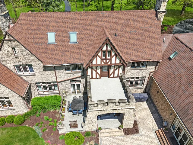 a kitchen with stainless steel appliances a refrigerator sink and cabinets