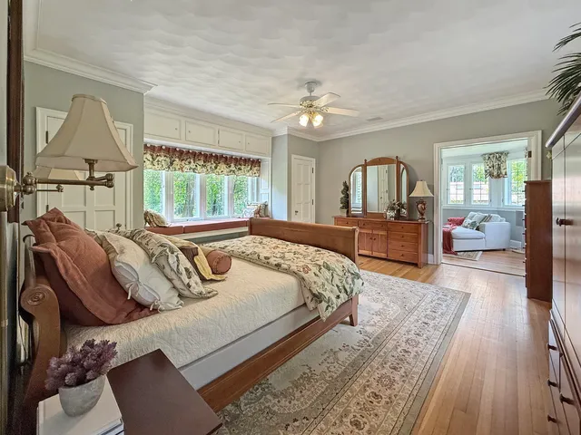 a lobby with furniture and a large window