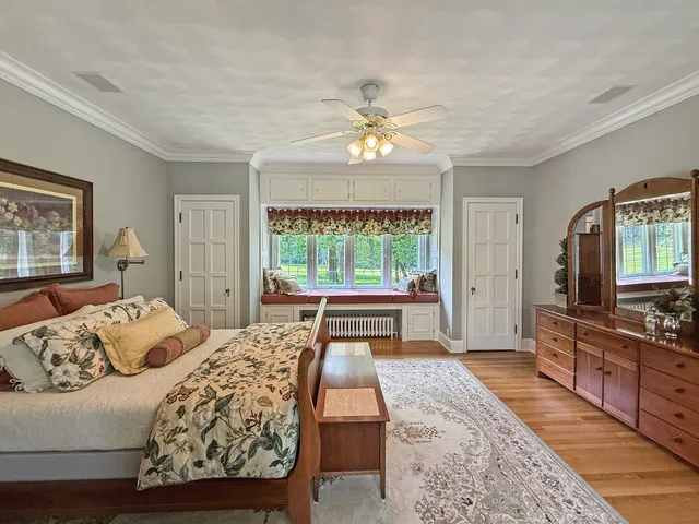 a bathroom with a sink toilet and mirror