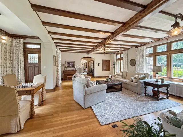 a large kitchen with stainless steel appliances kitchen island granite countertop a sink and cabinets