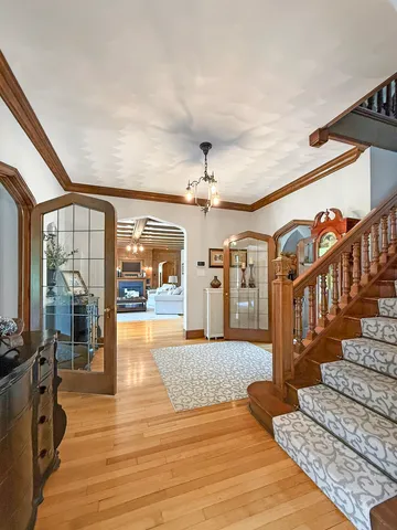an aerial view of a house with garden space and street view