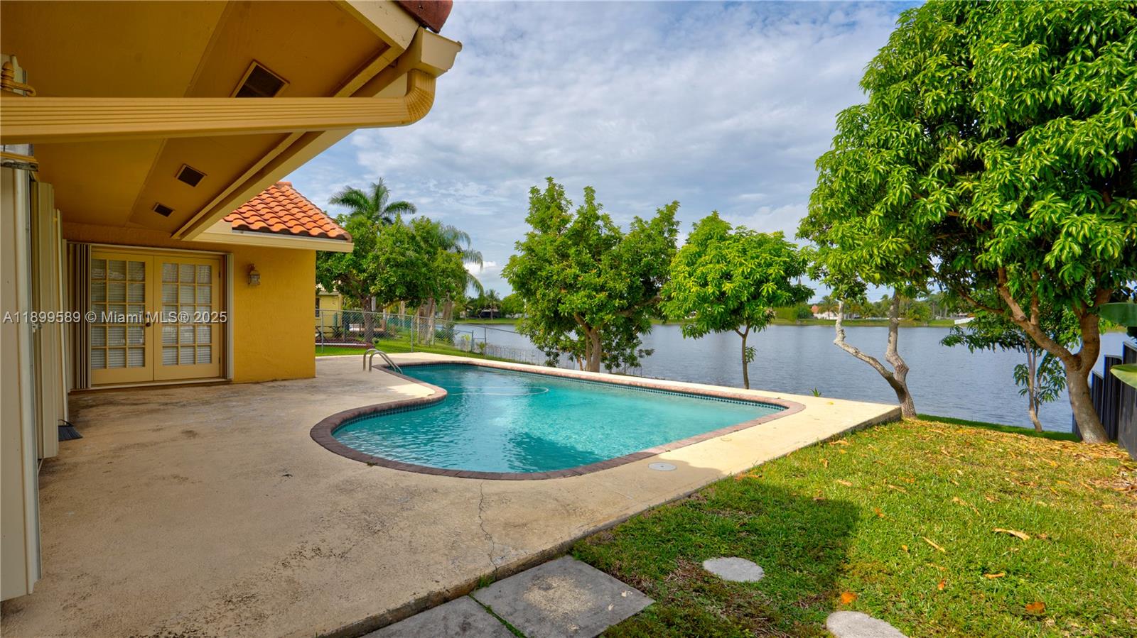 6255 Hawkes Bluff Avenue Davie, FL 33331 - Photo 13 of 51 a view of outdoor space yard and swimming pool