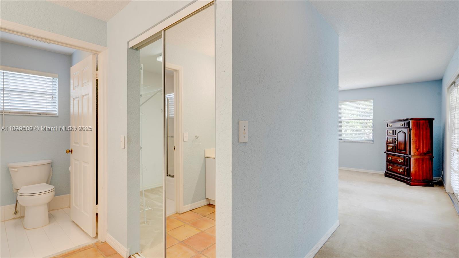 6255 Hawkes Bluff Avenue Davie, FL 33331 - Photo 34 of 51 a view of a bathroom with a tub shower and a sink