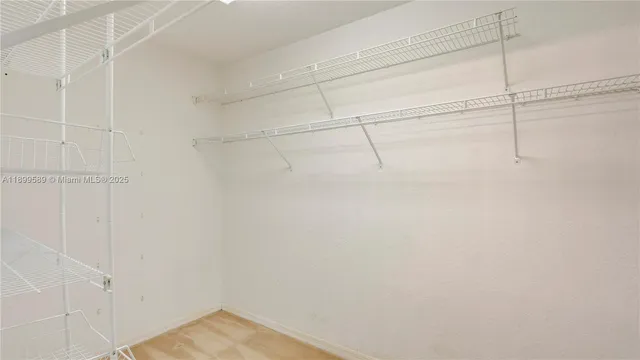 a view of a room with racks on the wall