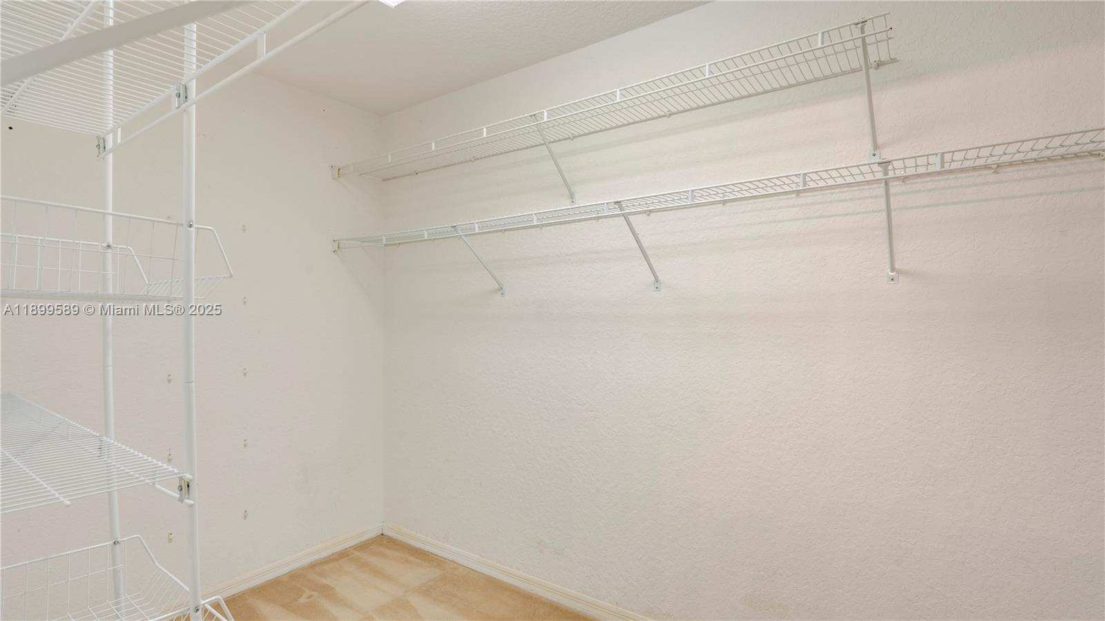 6255 Hawkes Bluff Avenue Davie, FL 33331 - Photo 38 of 51 a view of a room with racks on the wall