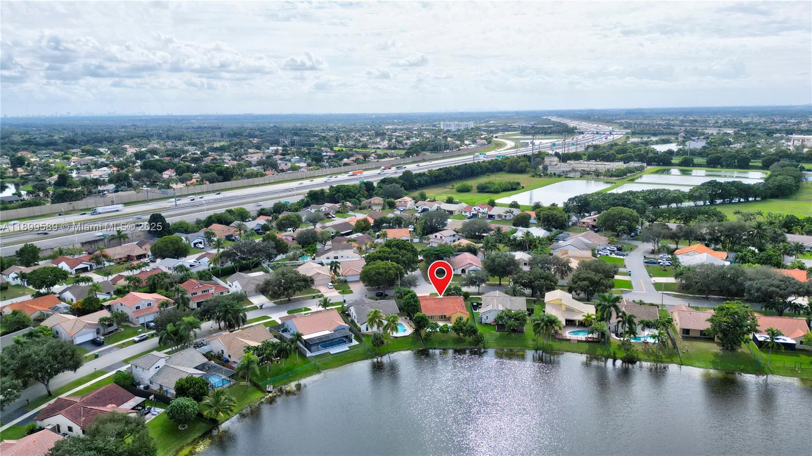 6255 Hawkes Bluff Avenue Davie, FL 33331 - Photo 4 of 51 a view of a city