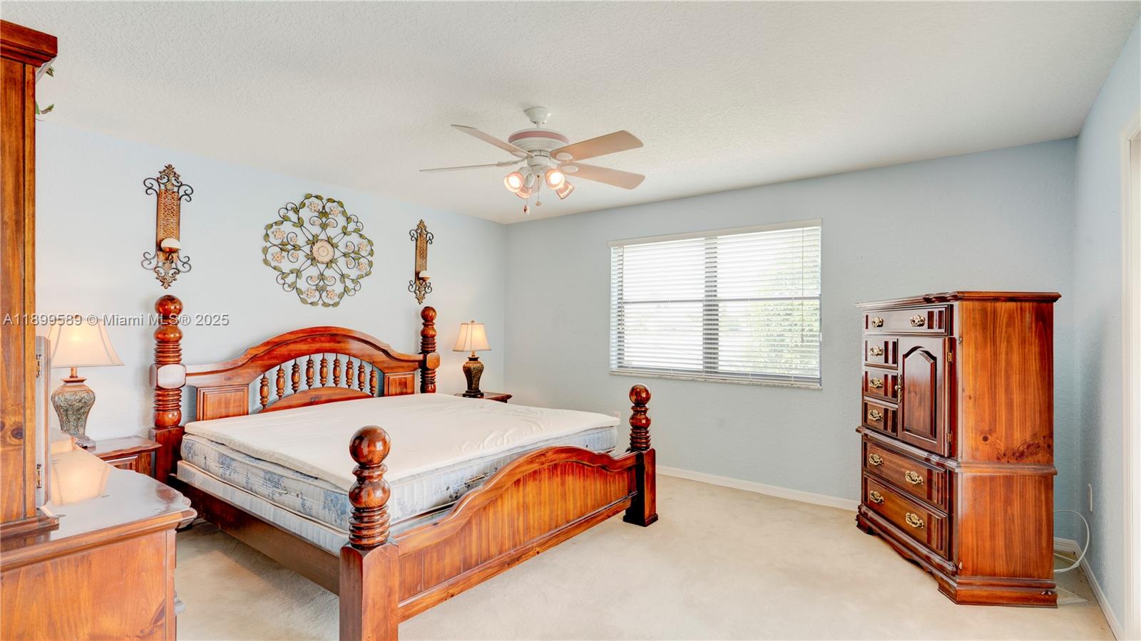 6255 Hawkes Bluff Avenue Davie, FL 33331 - Photo 41 of 51 a bedroom with a bed and a window
