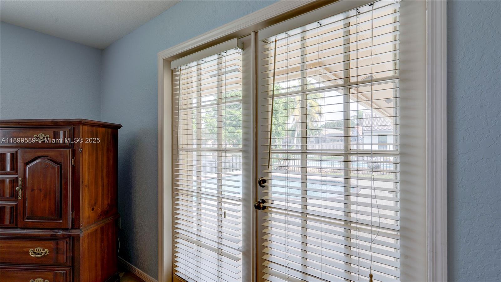 6255 Hawkes Bluff Avenue Davie, FL 33331 - Photo 45 of 51 a view of a bedroom with a large window