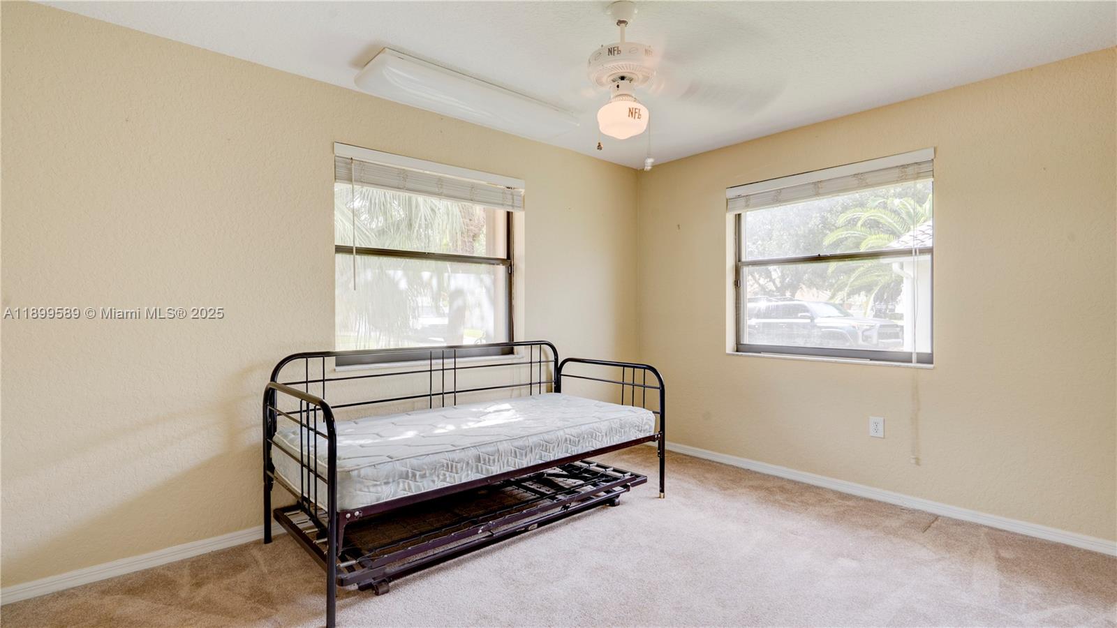 6255 Hawkes Bluff Avenue Davie, FL 33331 - Photo 46 of 51 a bedroom with a bed and window