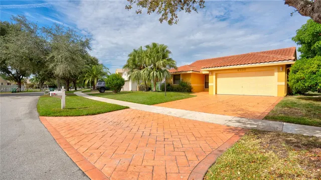 a view of backyard with green space