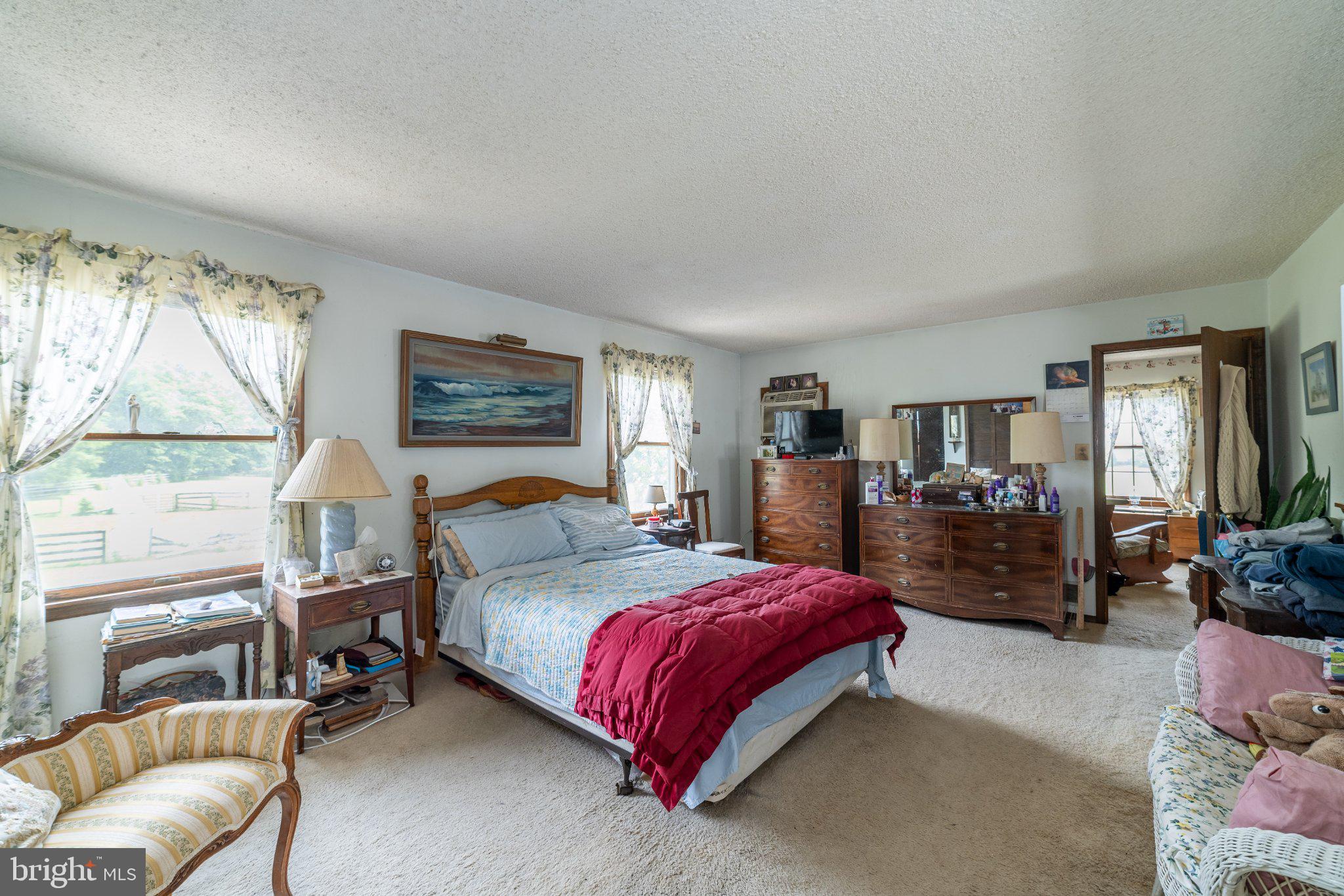 911 Monmouth Road New Egypt, NJ 08533 - Photo 17 of 19 Serene bedroom with natural light.
