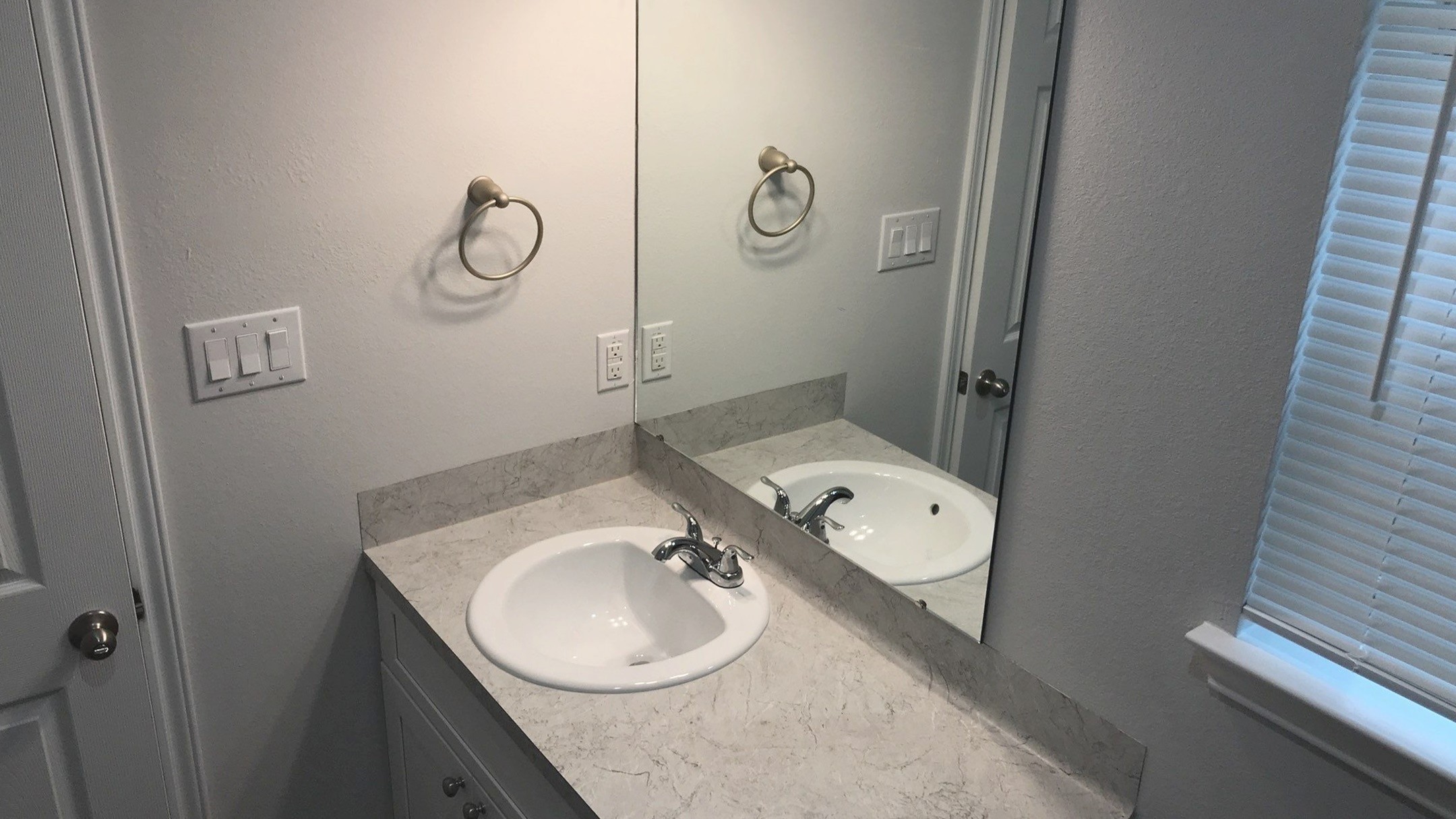 7309 Price, Unit B Houston, TX 77088 - Photo 14 of 27 a bathroom with a toilet sink and mirror