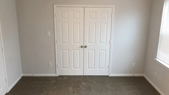 an empty room with window