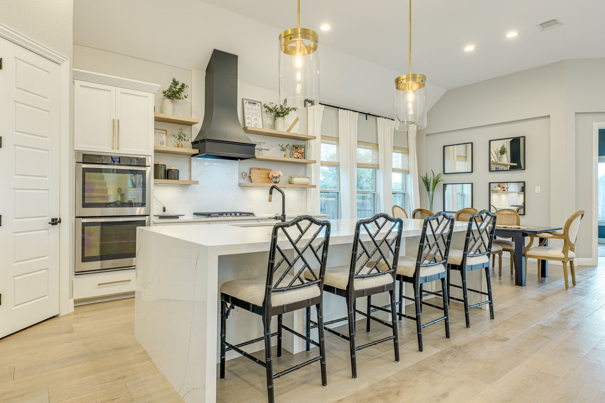 4209 Brean Down Road Pflugerville, TX 78660 - Photo 5 of 31 A pristine culinary space with an impressive kitchen island, offering both utility and a welcoming gathering spot.