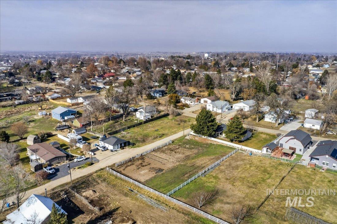 Tbd Syringa Lane Caldwell, ID 83605 - Photo 9 of 12 Aerial overview of property's location with nearby suburban area