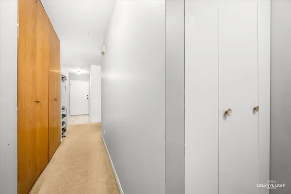 a view of a bathroom from a hallway
