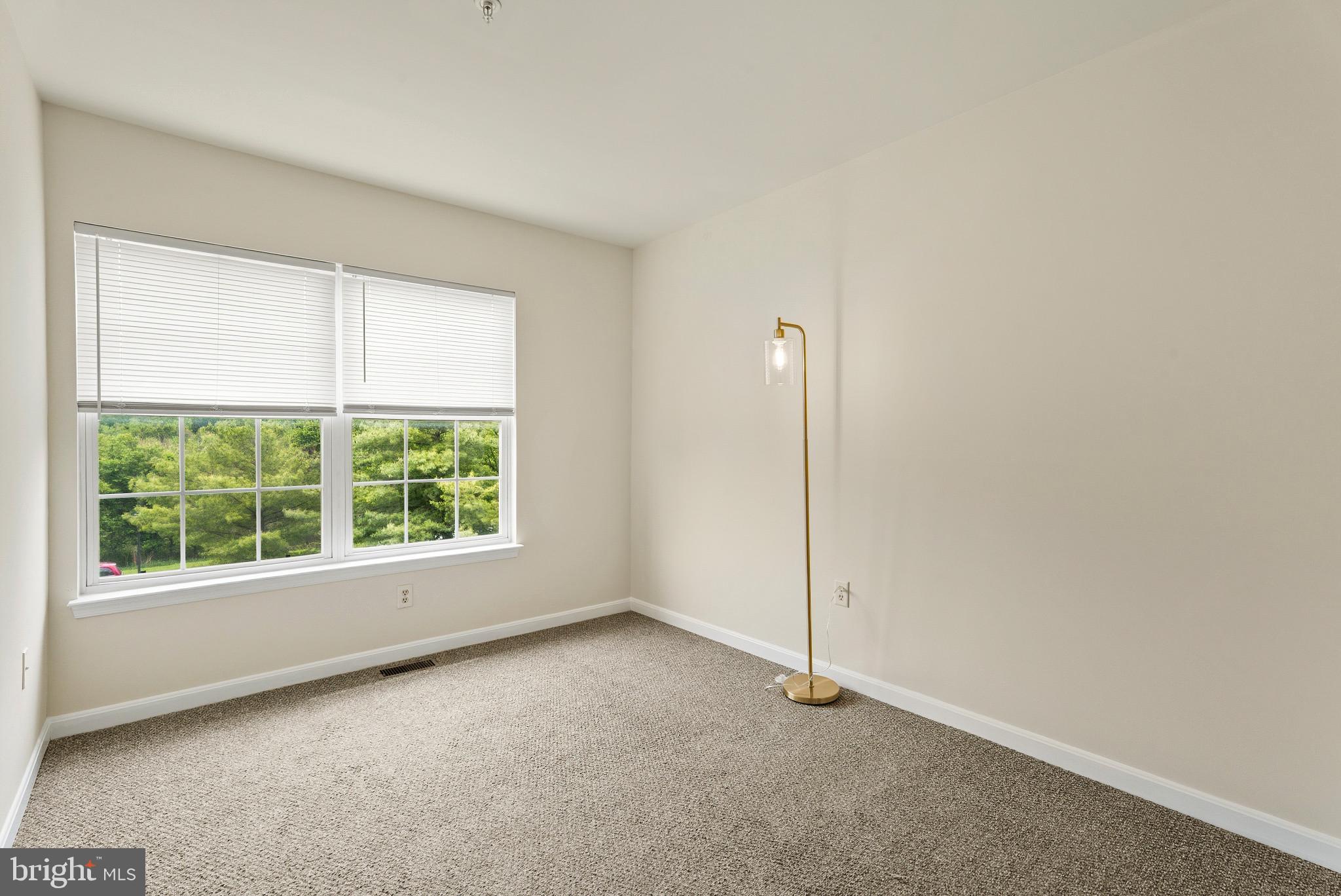 1709 Woodruff Way Frederick, MD 21701 - Photo 19 of 42 an empty room with a window