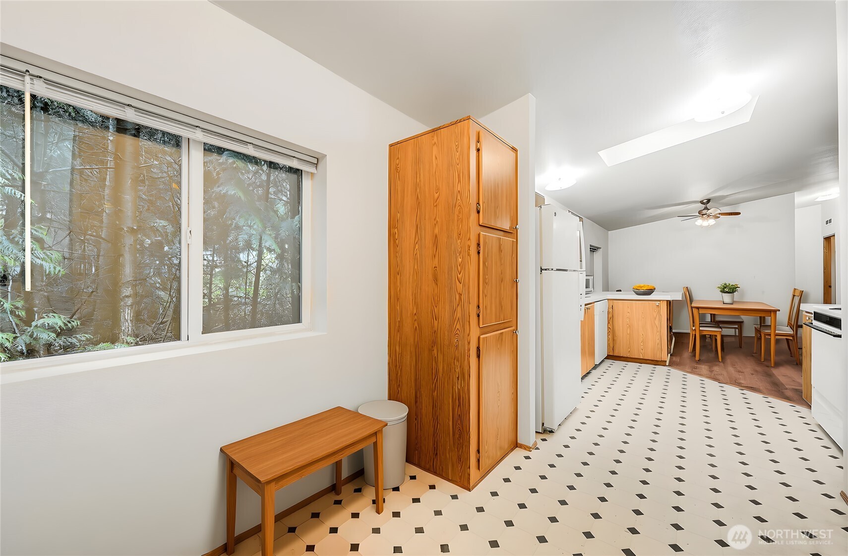 61 Flamingo Road Port Townsend, WA 98368 - Photo 11 of 22 a bedroom with furniture and a window