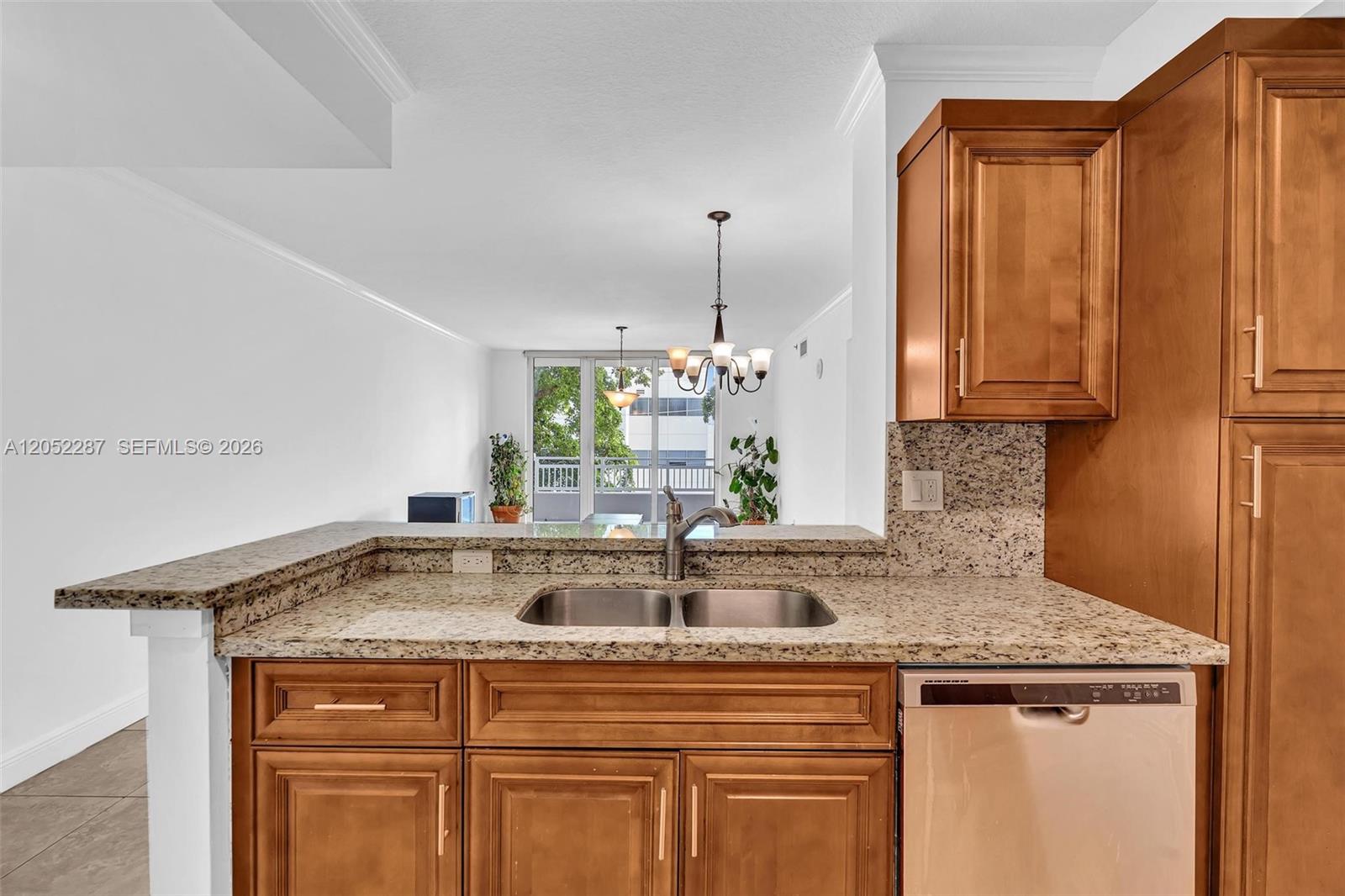 2665 Southwest 37th Avenue, Unit 313 Miami, FL 33133 - Photo 11 of 24 Looking into the living room.