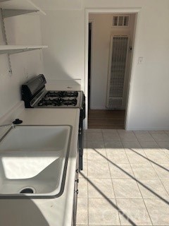 167 North Center Street Redlands, CA 92373 - Photo 8 of 19 a bathroom with a sink and a mirror