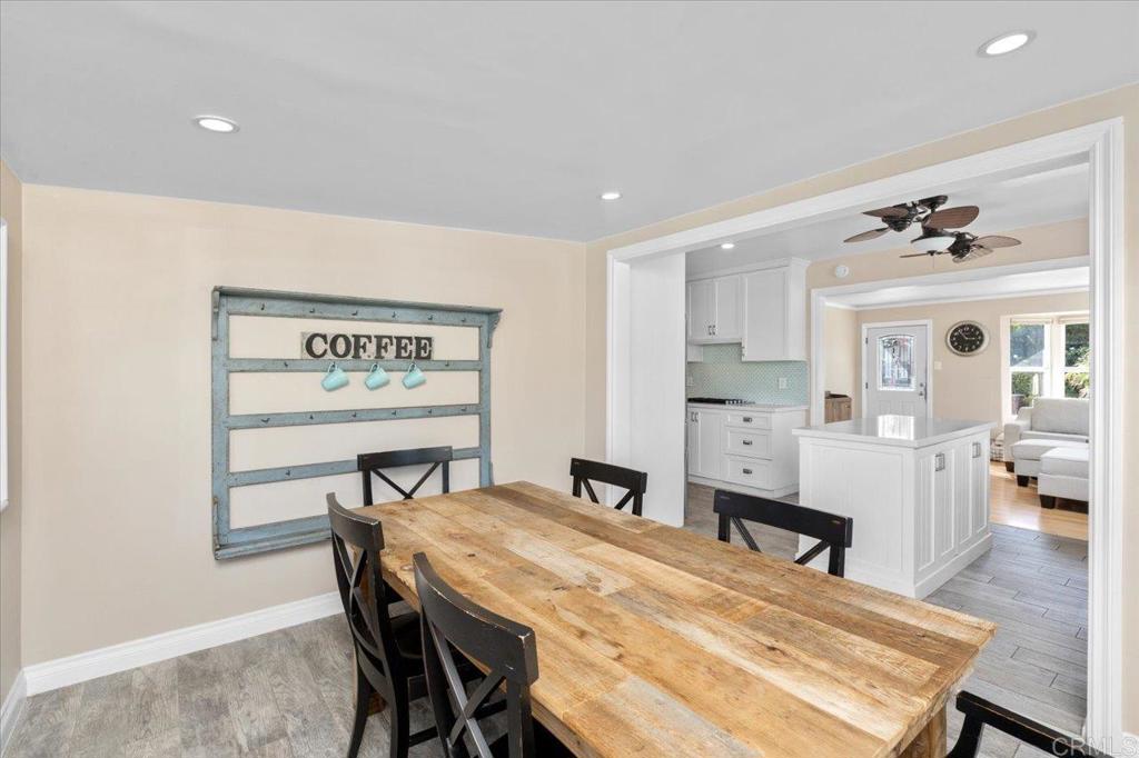 697 Ocean View Avenue Encinitas, CA 92024 - Photo 19 of 41 a view of a dining room with furniture