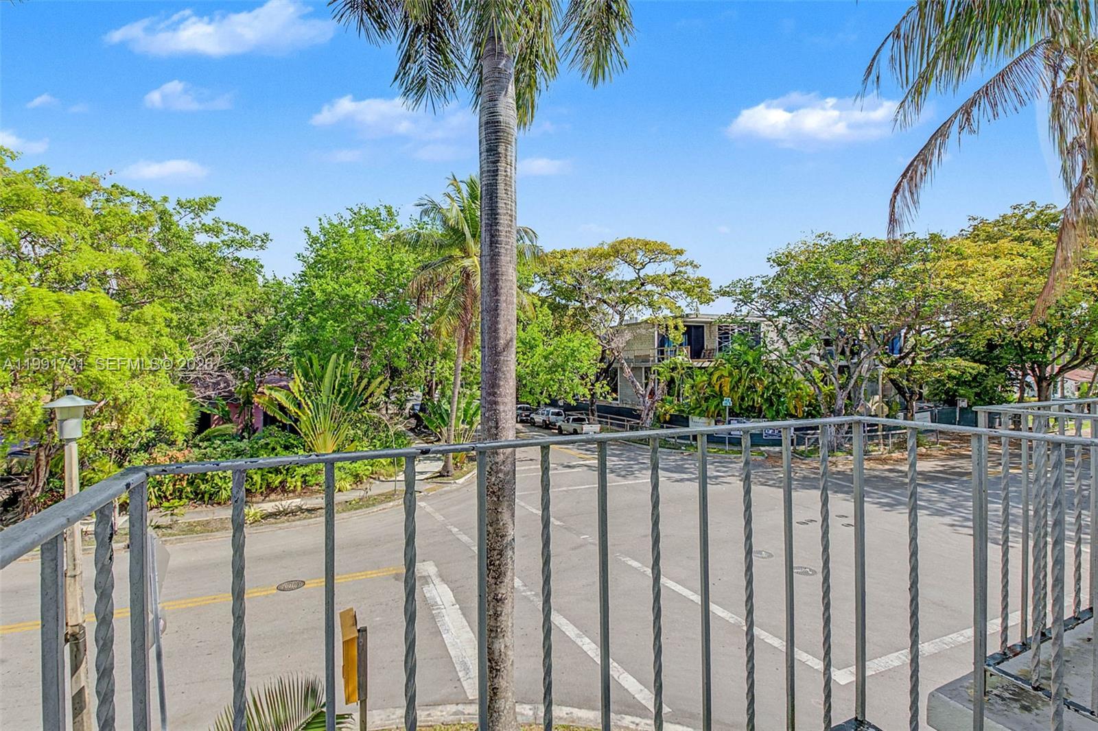 694 Northeast 76th Street, Unit 6 Miami, FL 33138 - Photo 22 of 35 a view of a balcony with an outdoor space