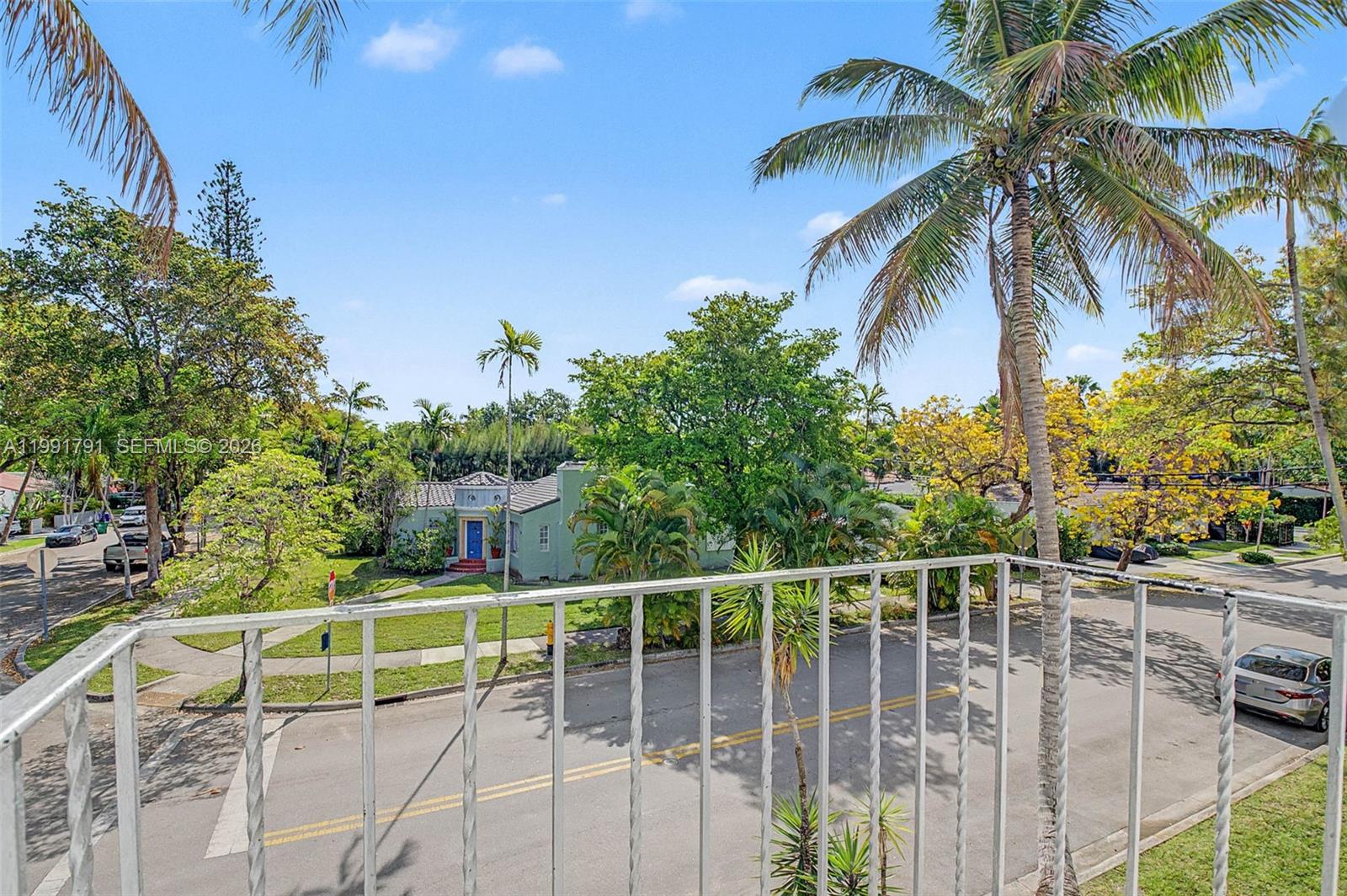 694 Northeast 76th Street, Unit 6 Miami, FL 33138 - Photo 24 of 35 a view of a yard with chairs