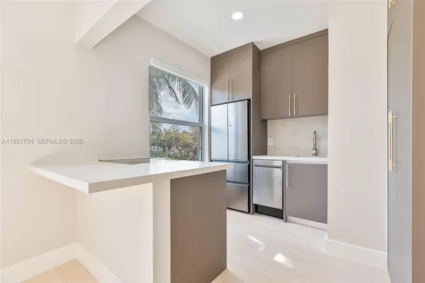 a view of a yard with chairs