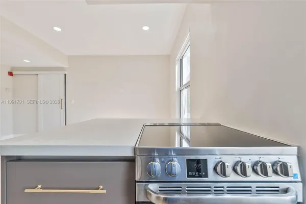 a view of a street with a building in the background