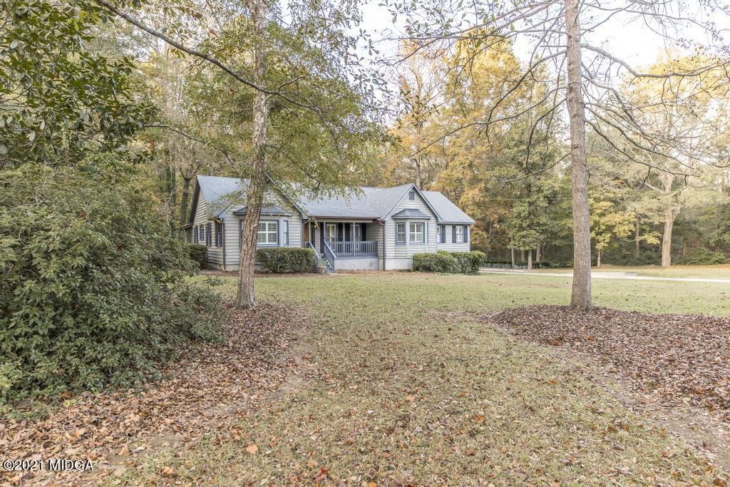7085 Colaparchee Road Macon, GA 31220 - Photo 4 of 57 a house with trees in front of it
