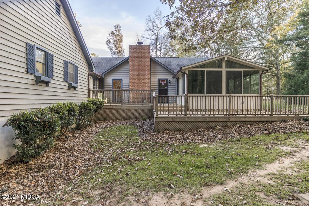 7085 Colaparchee Road Macon, GA 31220 - Photo 51 of 57 a view of a house with a yard