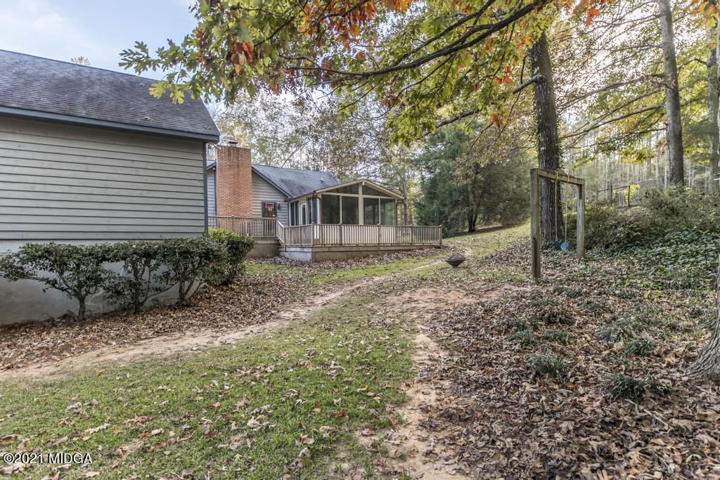 7085 Colaparchee Road Macon, GA 31220 - Photo 53 of 57 a house that has a tree in front of it