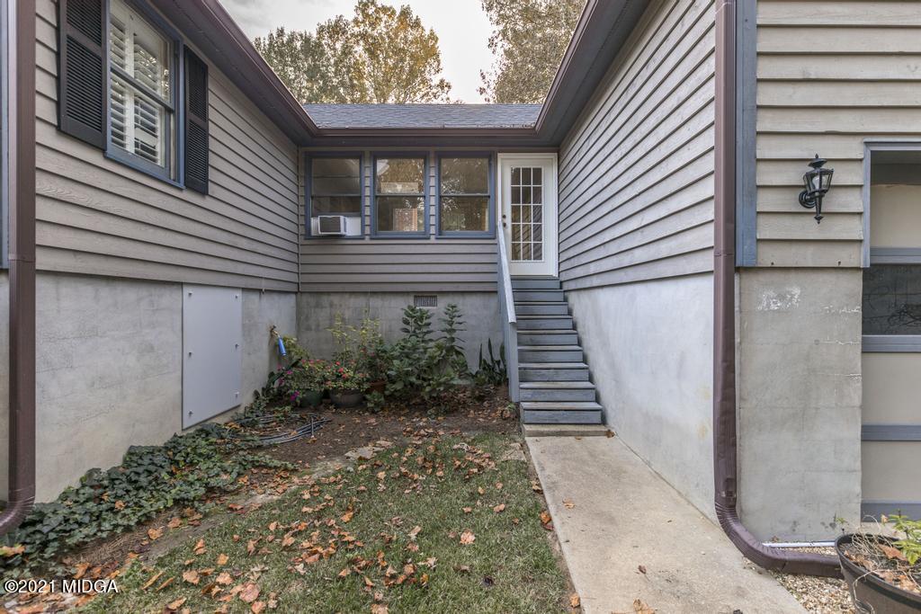 7085 Colaparchee Road Macon, GA 31220 - Photo 7 of 57 a view of a house with a yard