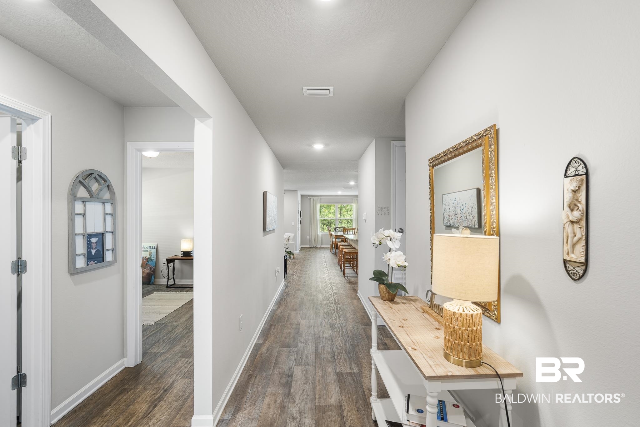 10232 Brodick Loop Spanish Fort, AL 36527 - Photo 3 of 29 Hall featuring dark wood-style flooring and baseboards
