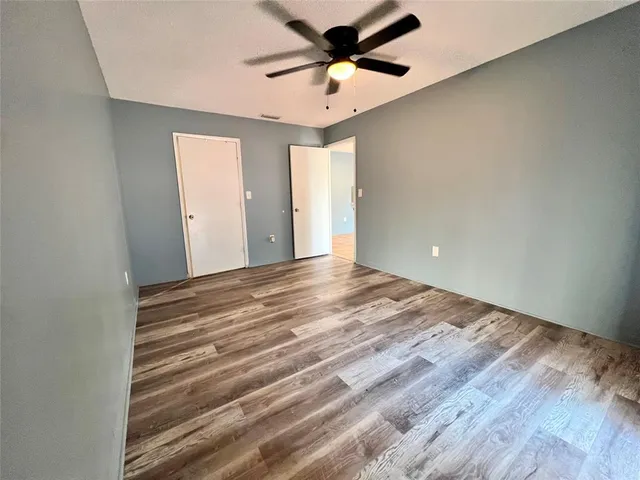 a view of a room with racks on the wall