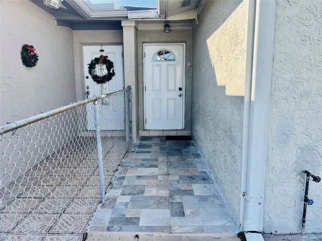a kitchen with stainless steel appliances a sink cabinets and a stove top oven