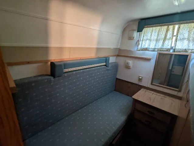 a view of storage and utility room with washer and dryer