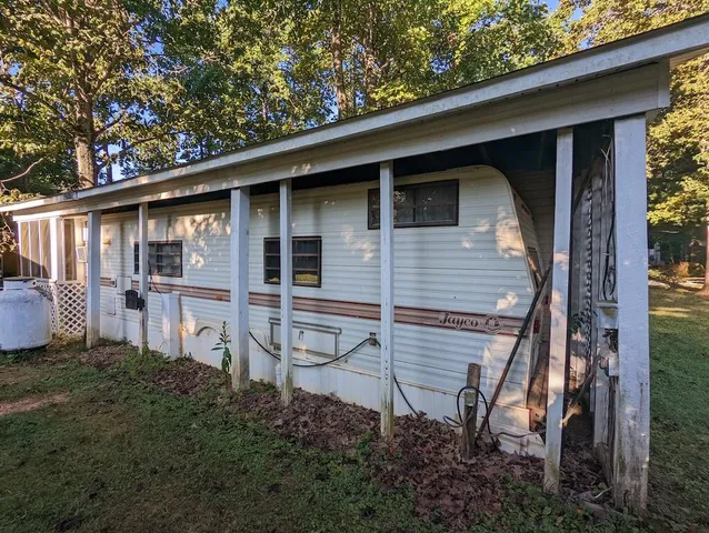 a backyard of a house with lots of green space