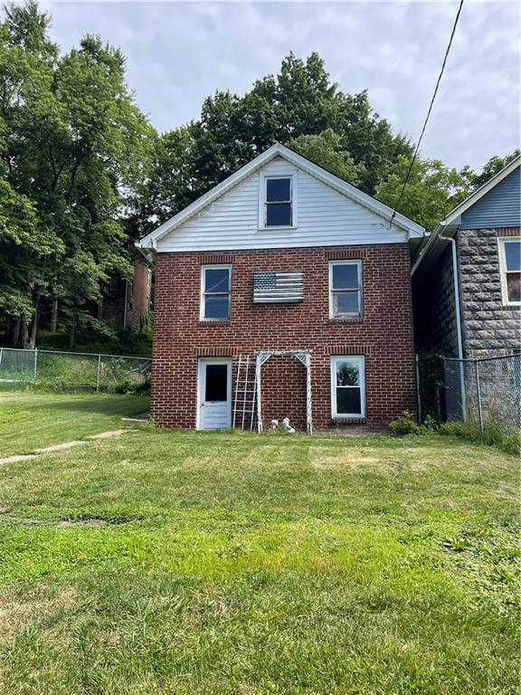 244 West Pearl Street Butler, PA 16001 - Photo 4 of 25 a front view of a house with a yard