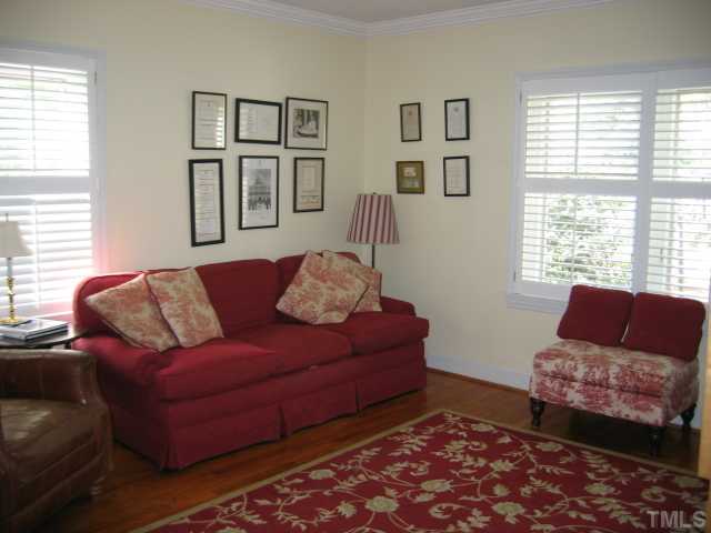 1306 Rand Drive Raleigh, NC 27608 - Photo 4 of 12 a living room with furniture and a window
