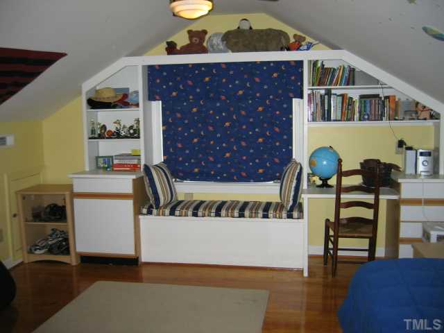 1306 Rand Drive Raleigh, NC 27608 - Photo 9 of 12 a workspace with furniture and window