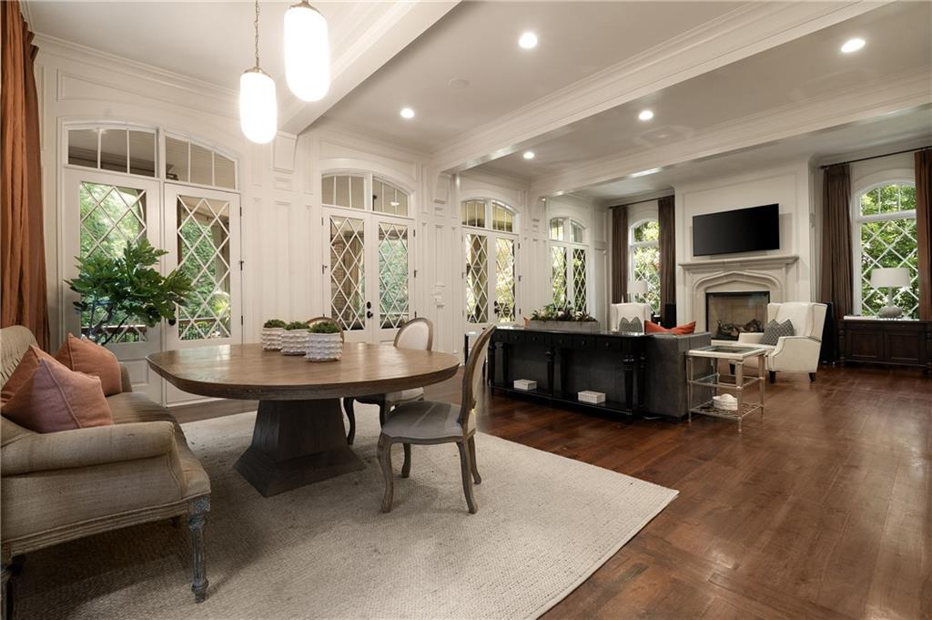 4136 North Stratford Road Northeast Atlanta, GA 30342 - Photo 12 of 78 a living room with furniture kitchen view and a large window