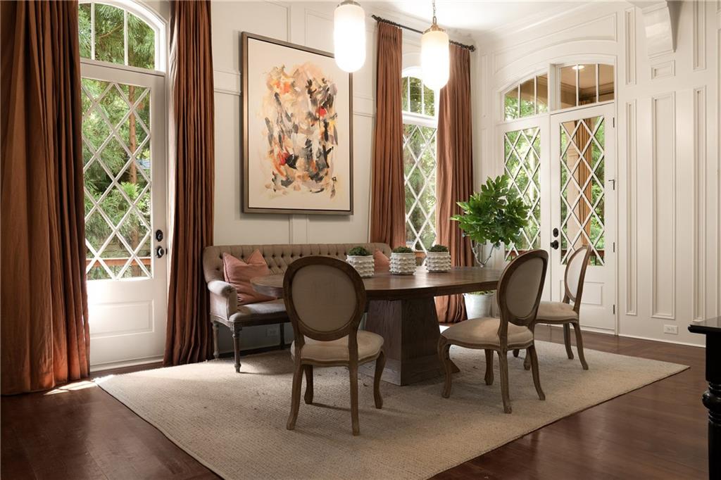 4136 North Stratford Road Northeast Atlanta, GA 30342 - Photo 13 of 78 a view of a dining room with furniture window and wooden floor