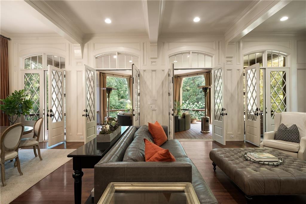 4136 North Stratford Road Northeast Atlanta, GA 30342 - Photo 22 of 78 a living room with furniture and a large window