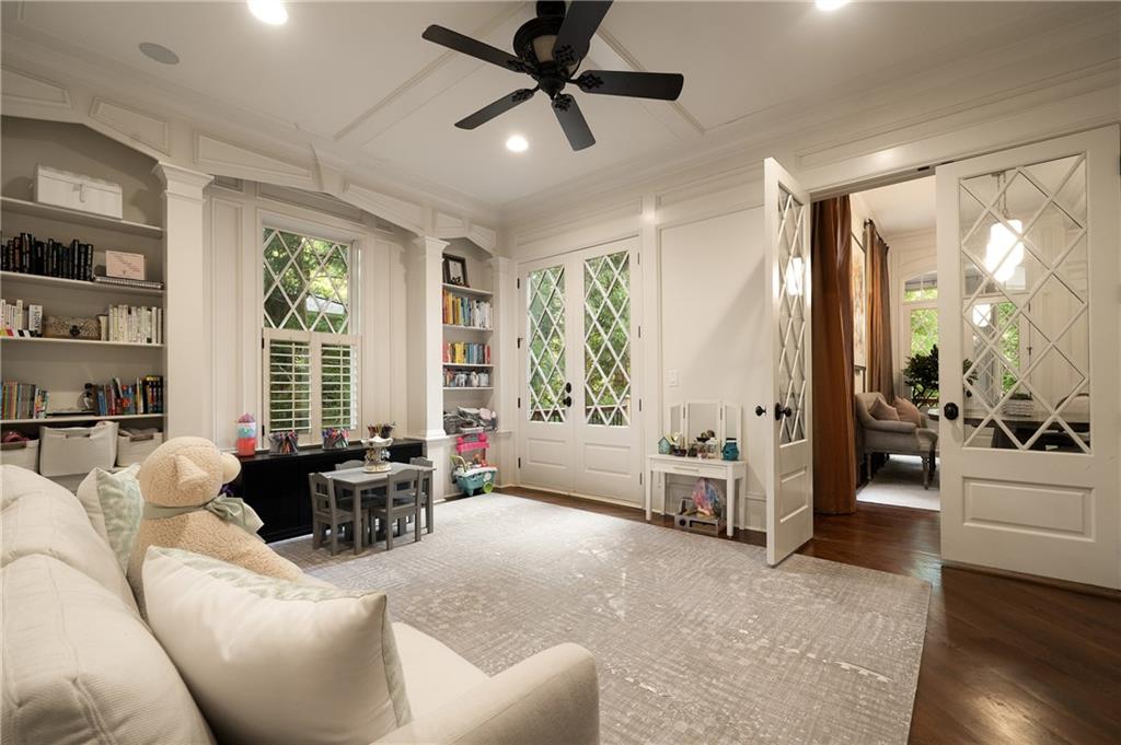 4136 North Stratford Road Northeast Atlanta, GA 30342 - Photo 27 of 78 a living room with furniture and large windows